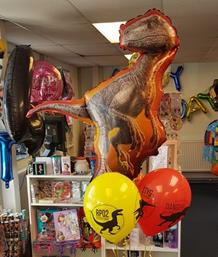 Jurassic World Dinosaur Balloons filled with helium, in Shepshed.